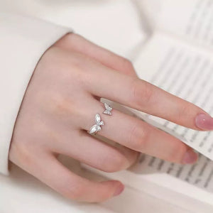 silver ring with butterfly and not applicable