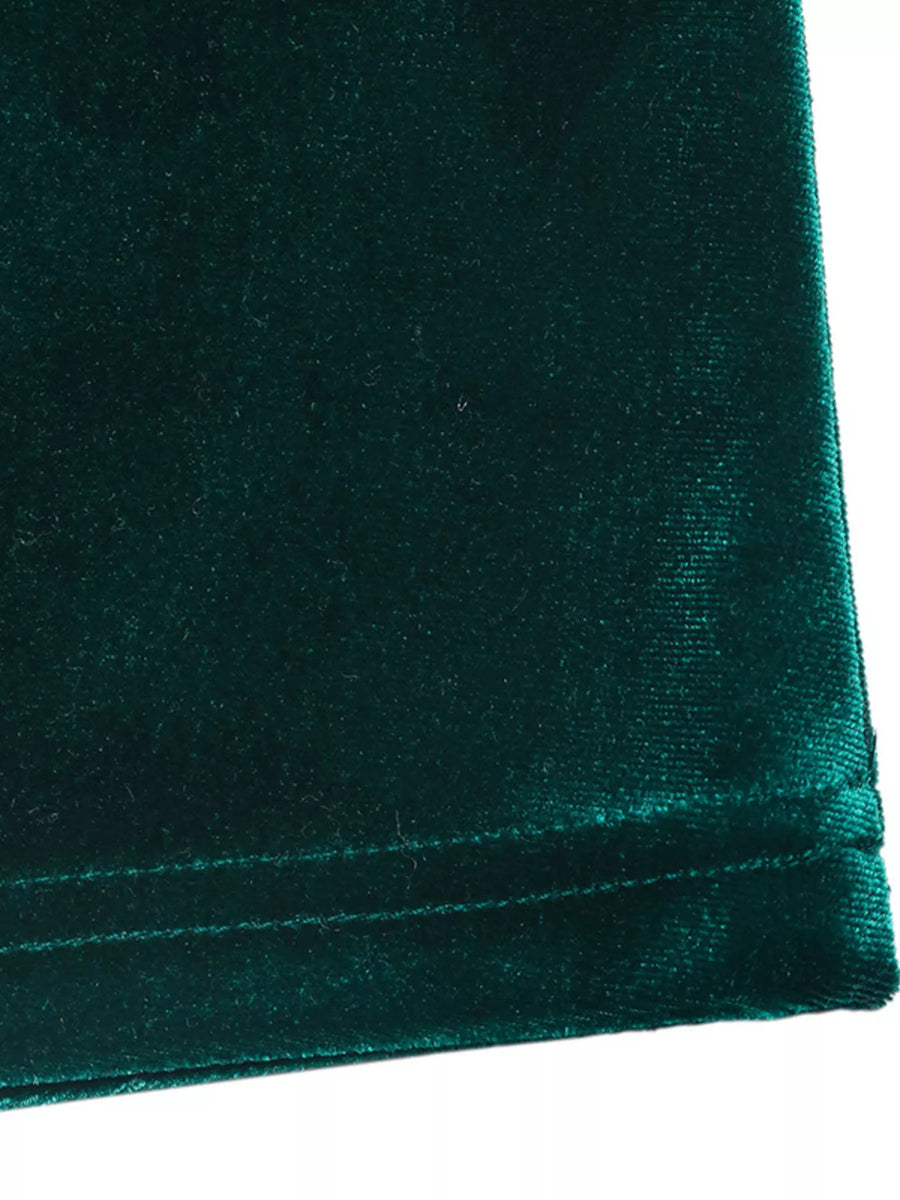 Green velvet maxi dress with ruched detail and V-neck.