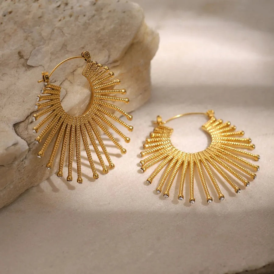 18K Gold-Plated,Stainless Steel,Zircon (accent stones) Care instructions: Avoid earrings in gold with flared silhouette