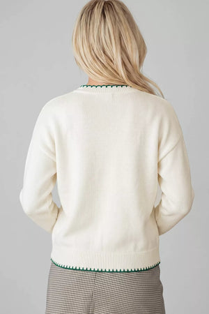 pullover sweater in ivory featuring basic style and relaxed fit