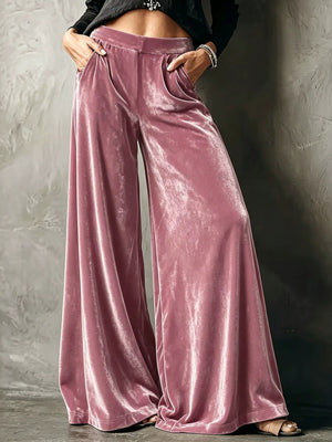 wide-leg pants in dusty rose featuring pocketed and flared fit