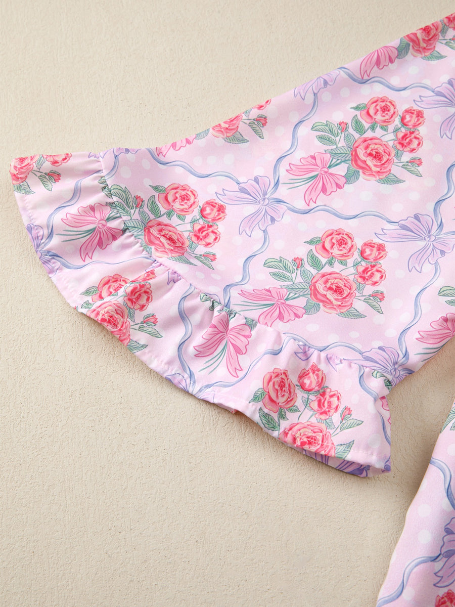 Pink floral and bow print maternity shirt with ruffled sleeves