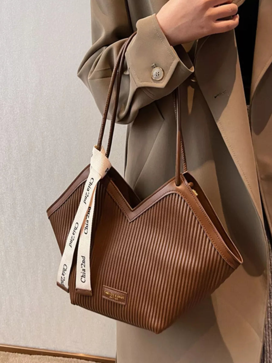 Brown ribbed texture large shoulder bag with white logo straps