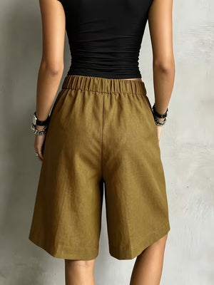 High-Waisted Drawstring Shorts in olive green with tied