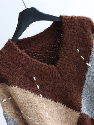 v-neck sweater featuring argyle in slate gray with 100% polyester Care instructions: Machine wash cold texture