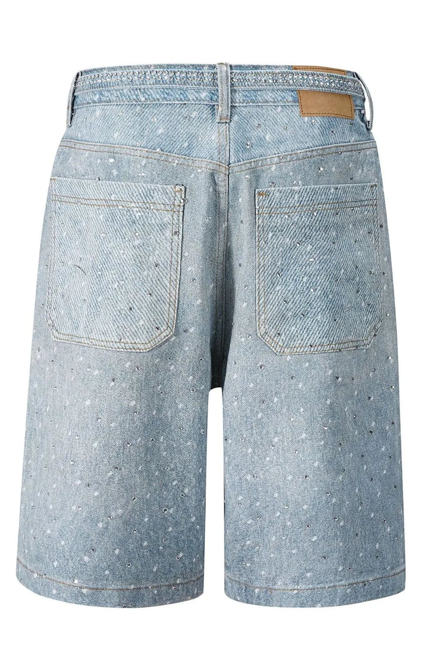 Embellished denim bermuda shorts in medium wash with allover rhinestones and tie detail.