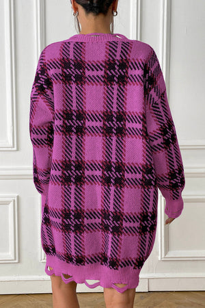 Fuchsia plaid knit mini dress with distressed hem and long sleeves.