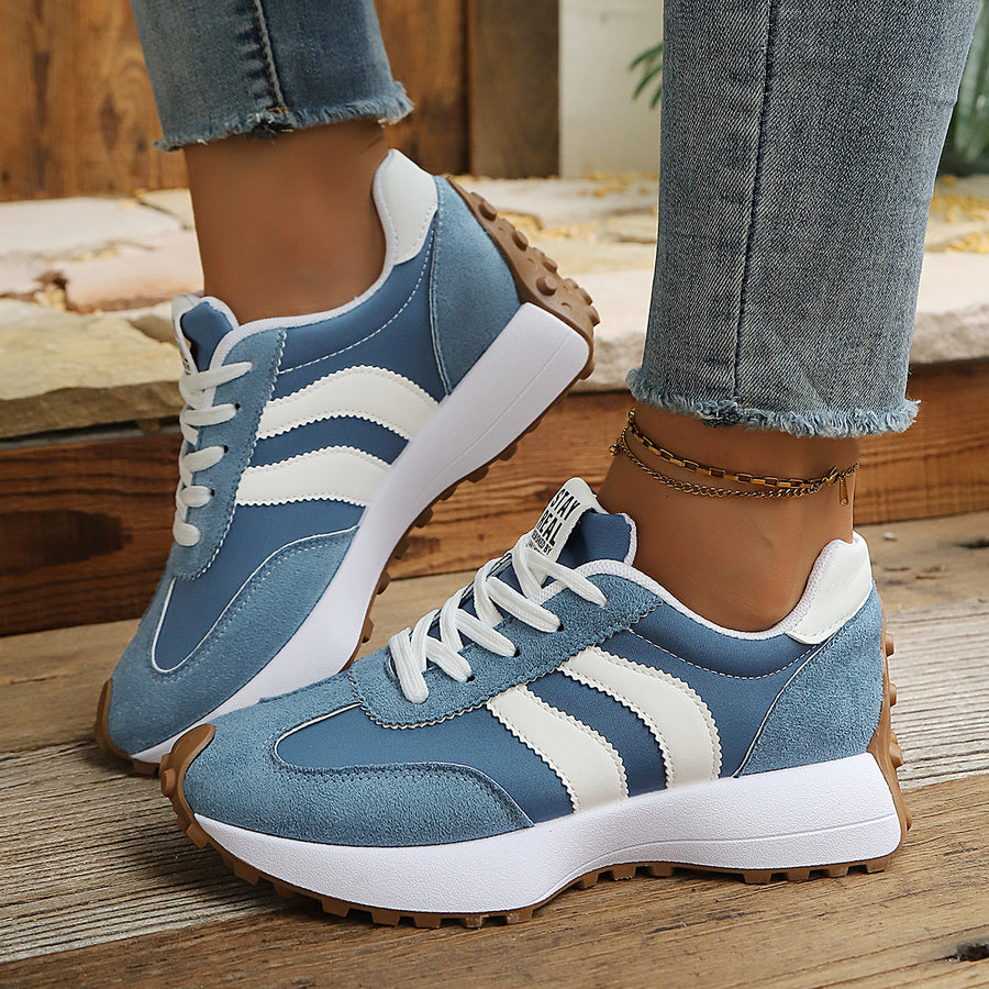 sneakers in Purple with striped and round toe