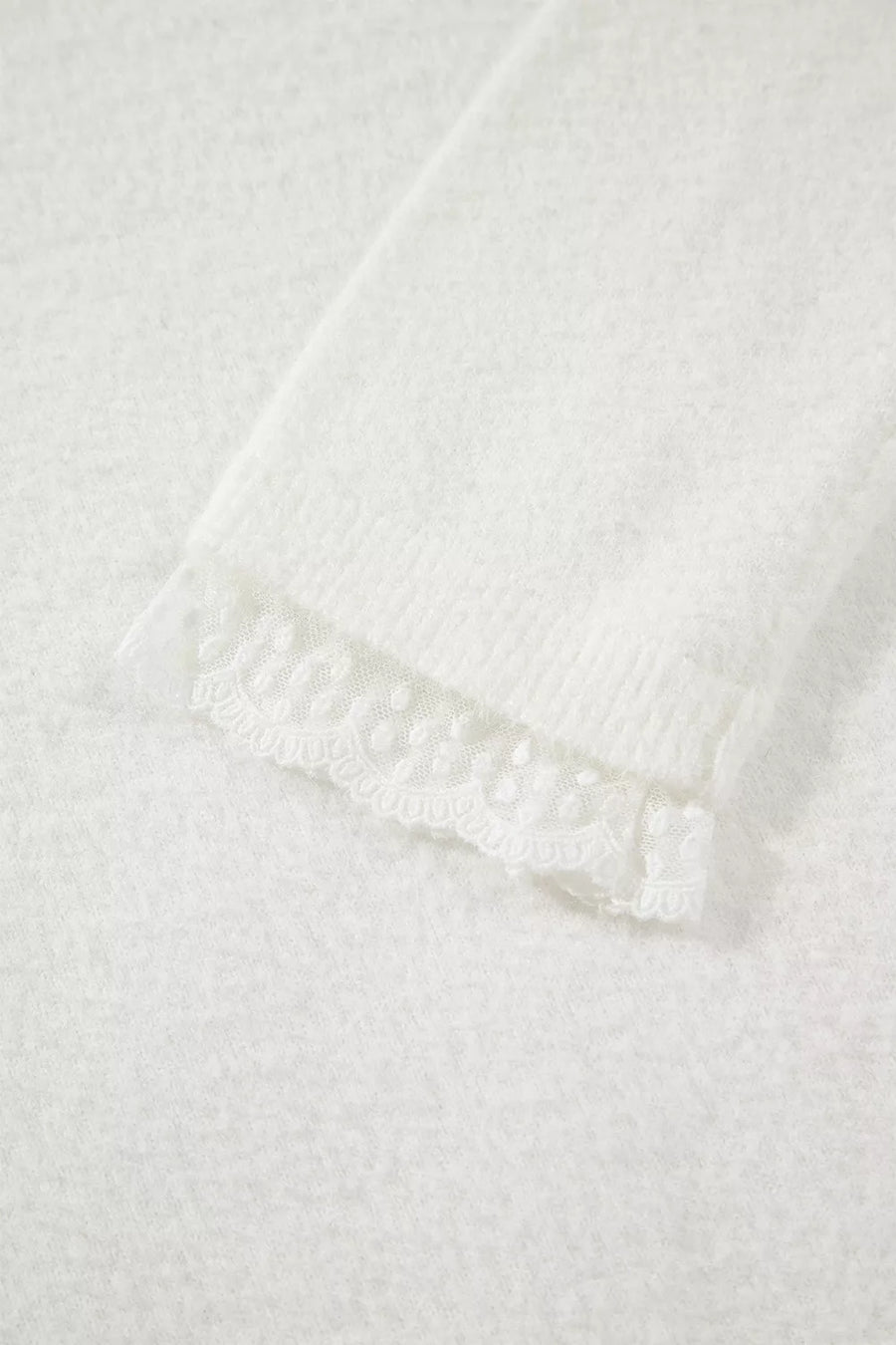 pullover sweater in White with lace trim and hip-length
