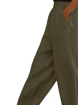 Army green maternity pants with wide legs and pockets.