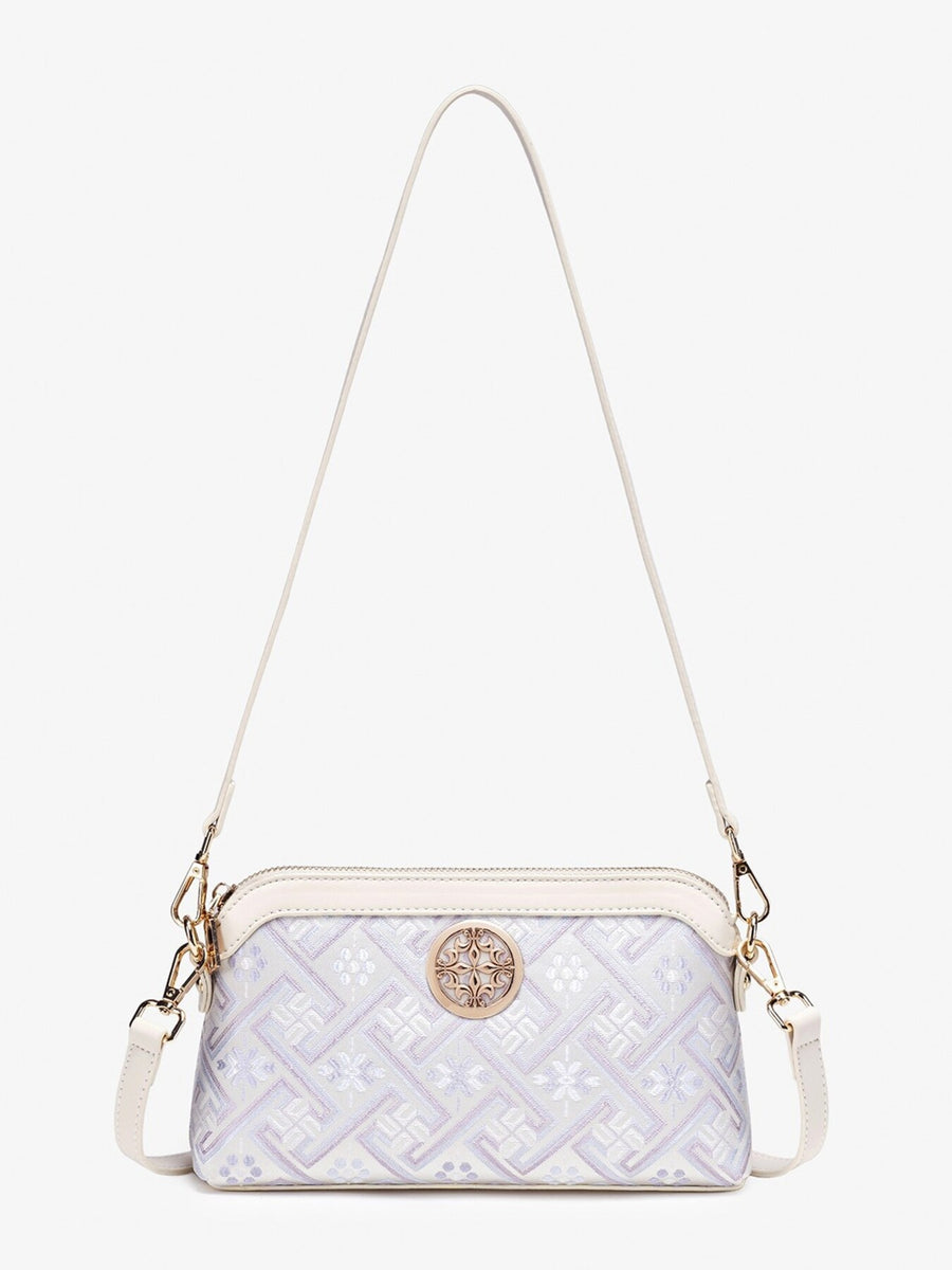 crossbody bag in off-white with geometric and adjustable strap
