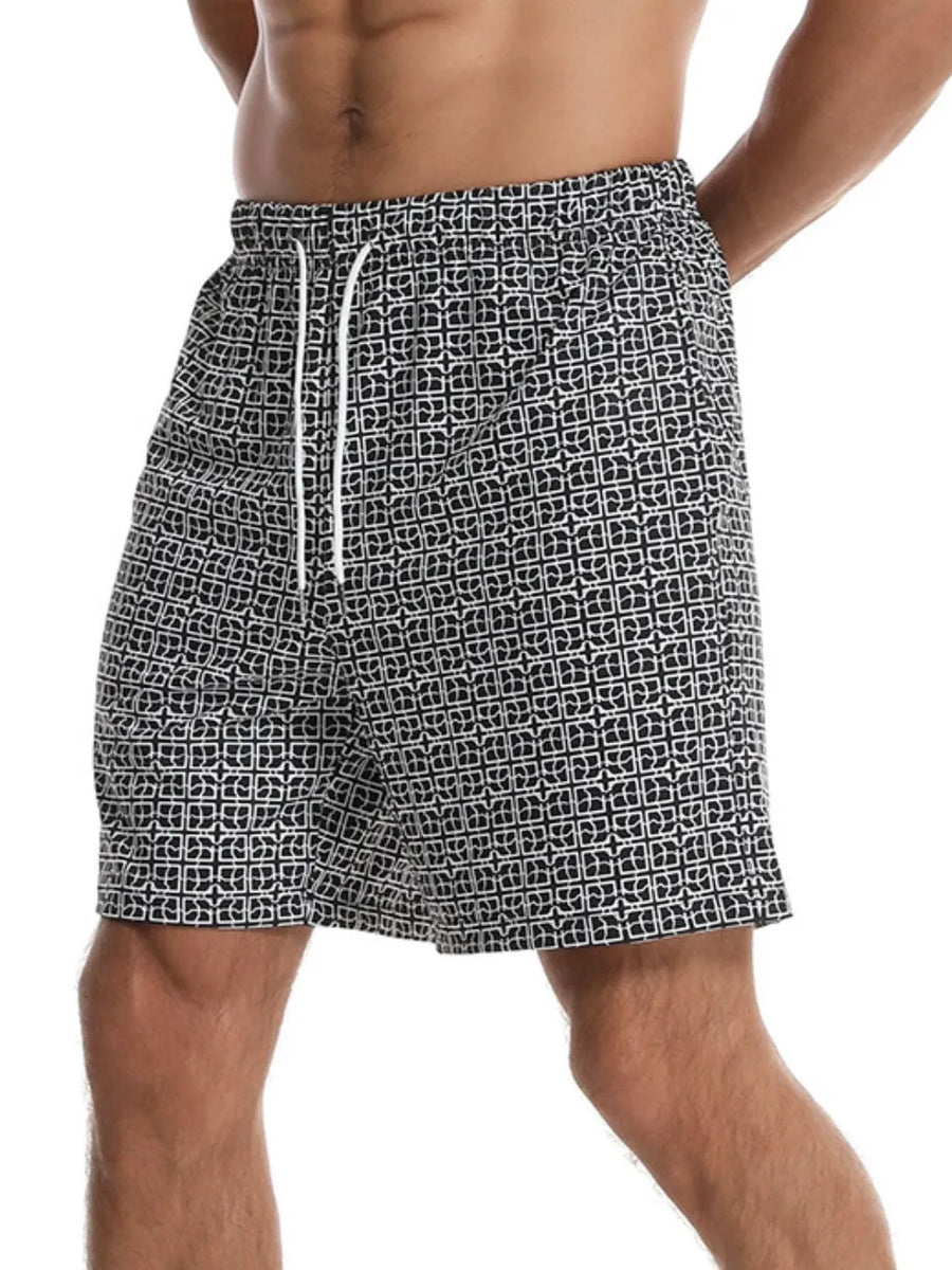 Black geometric print boardshorts with white drawstring