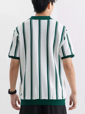 Men's white short sleeve polo with green vertical stripes and green collar.