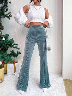 Peacock Blue corduroy maternity flare pants with a high waist and bell bottoms.