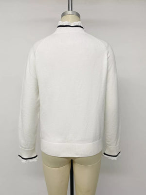 pullover sweater in ivory with bow and hip-length