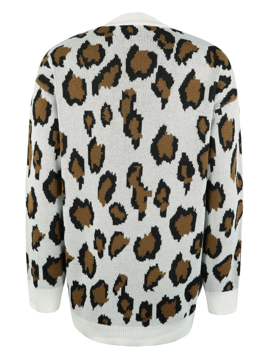 White leopard print knit cardigan with open front and long sleeves.