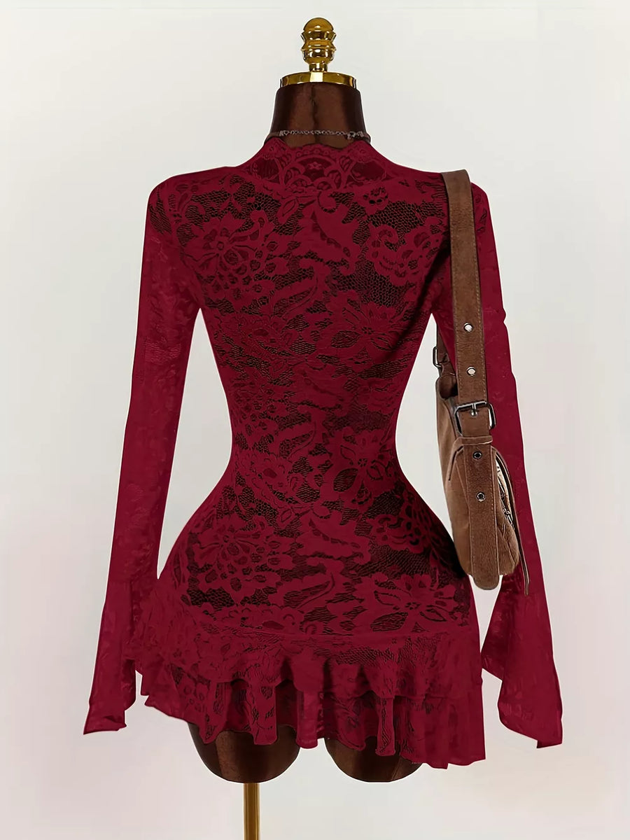 100% polyester Care instructions: Machine wash cold blouse in burgundy with fitted silhouette