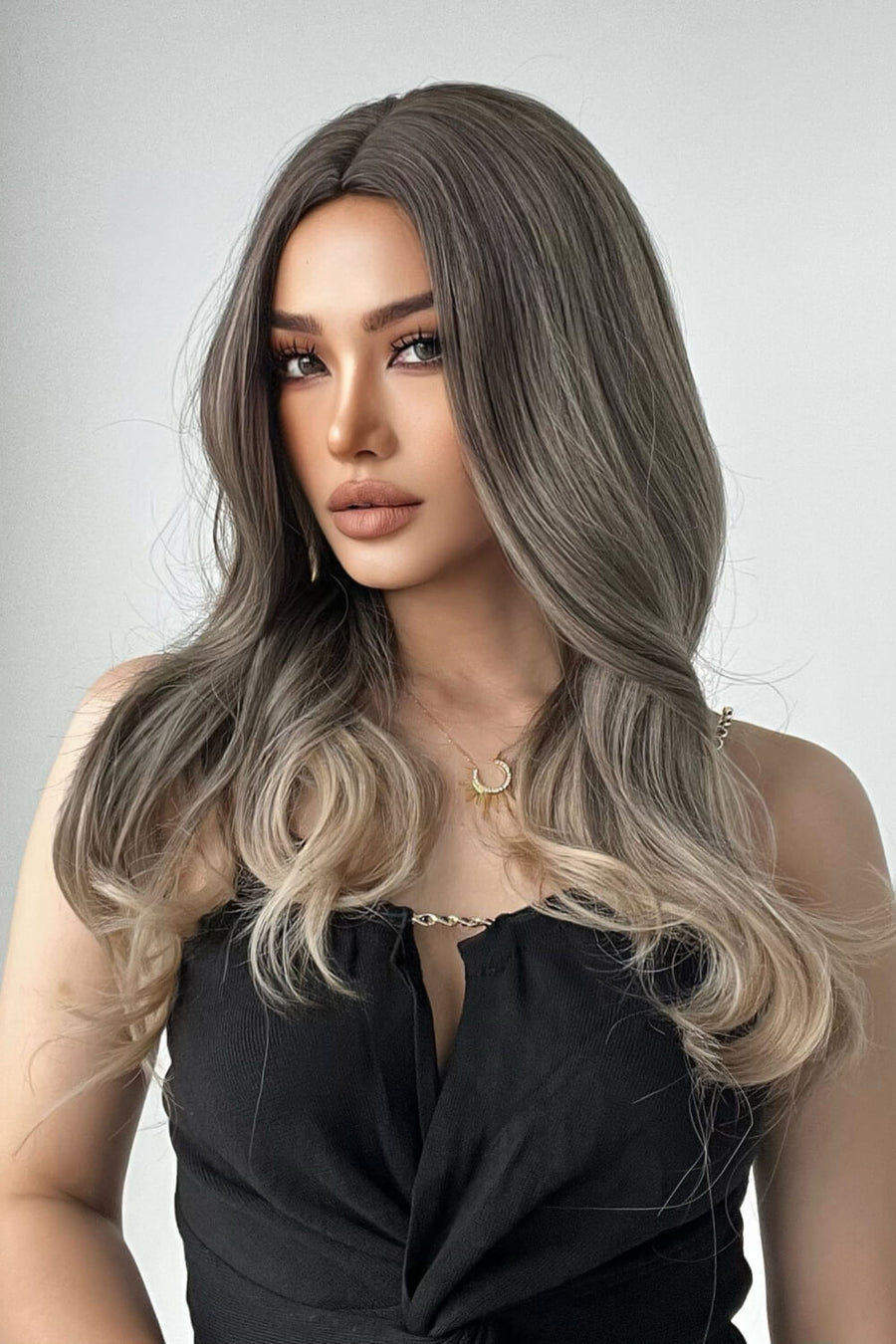 Ombre Wave Synthetic Wig in Ash Brown/Blonde Ombre, styled with loose waves.