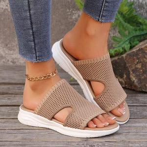 Khaki mesh open-toe slide sandals with white soles and a gold ankle chain.
