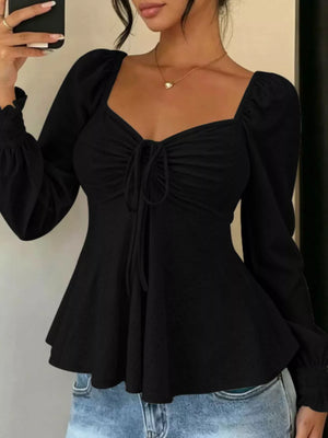 Yellow peplum top with hip-length and pullover