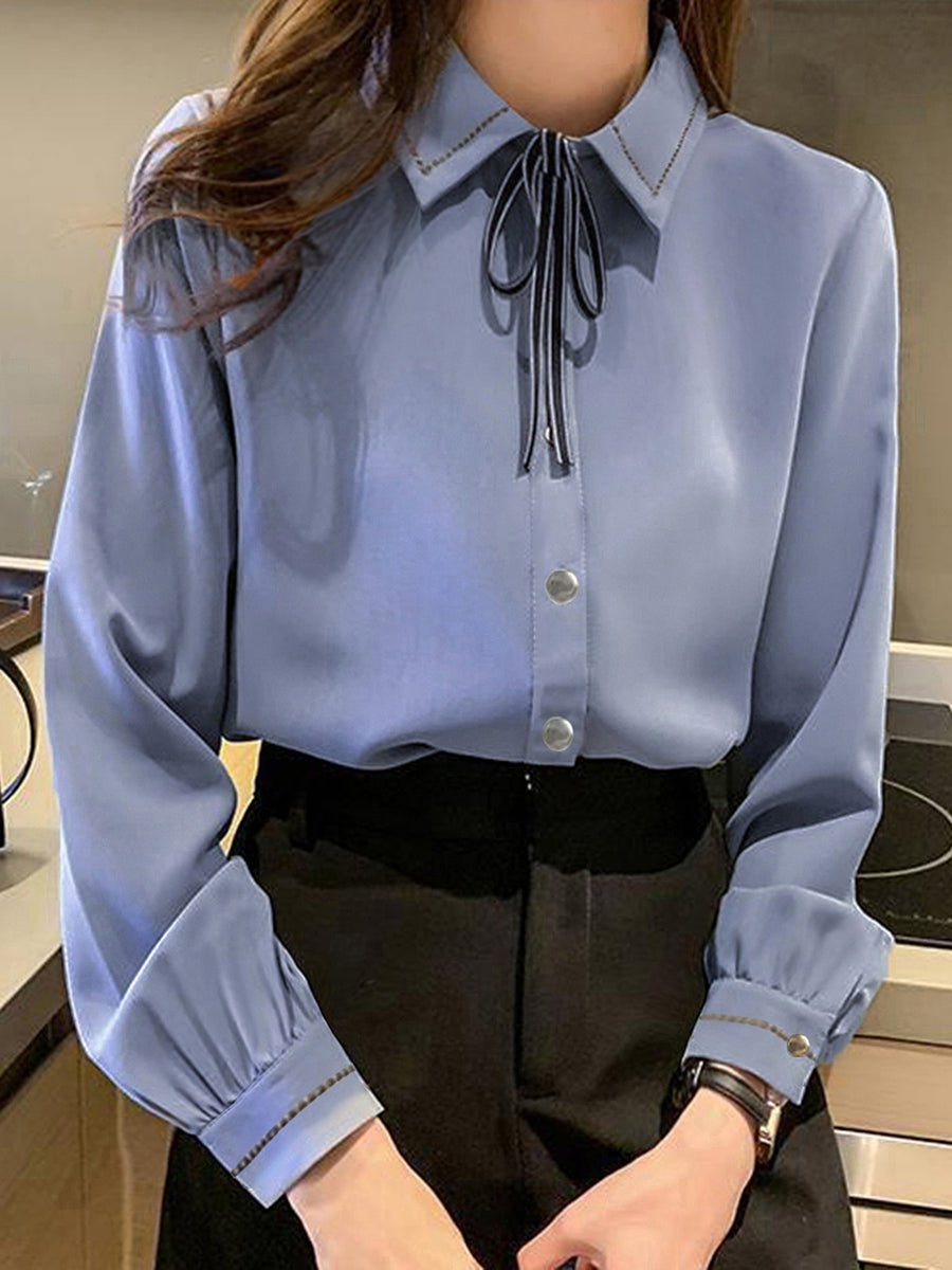 100% polyester Care instructions: Machine wash cold blouse in Apricot with regular silhouette