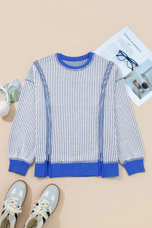 white sweatshirt with hip-length and pullover