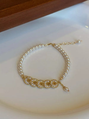 ACCESSORIES in ivory featuring pearl accents and fitted fit