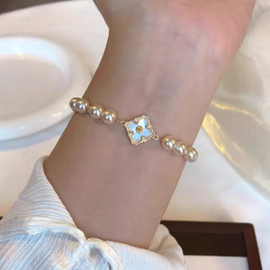 Synthetic Pearl,18K Gold-Plated,Alloy,White mother-of-pearl Care instructions: 1 bracelet in gold with fitted silhouette