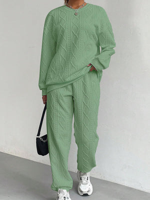 Cable knit lounge set in Gum Leaf green, featuring a crewneck sweatshirt and relaxed fit pants.