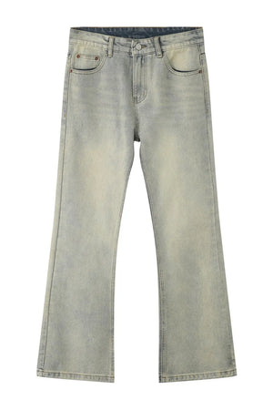 Vintage wash flare denim trousers in light blue with a faded effect.