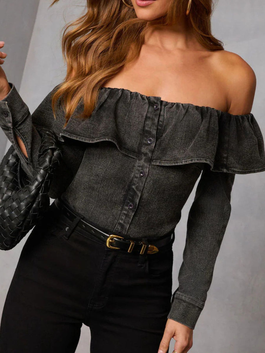 Black denim off-shoulder blouse with ruffles and button-down front.