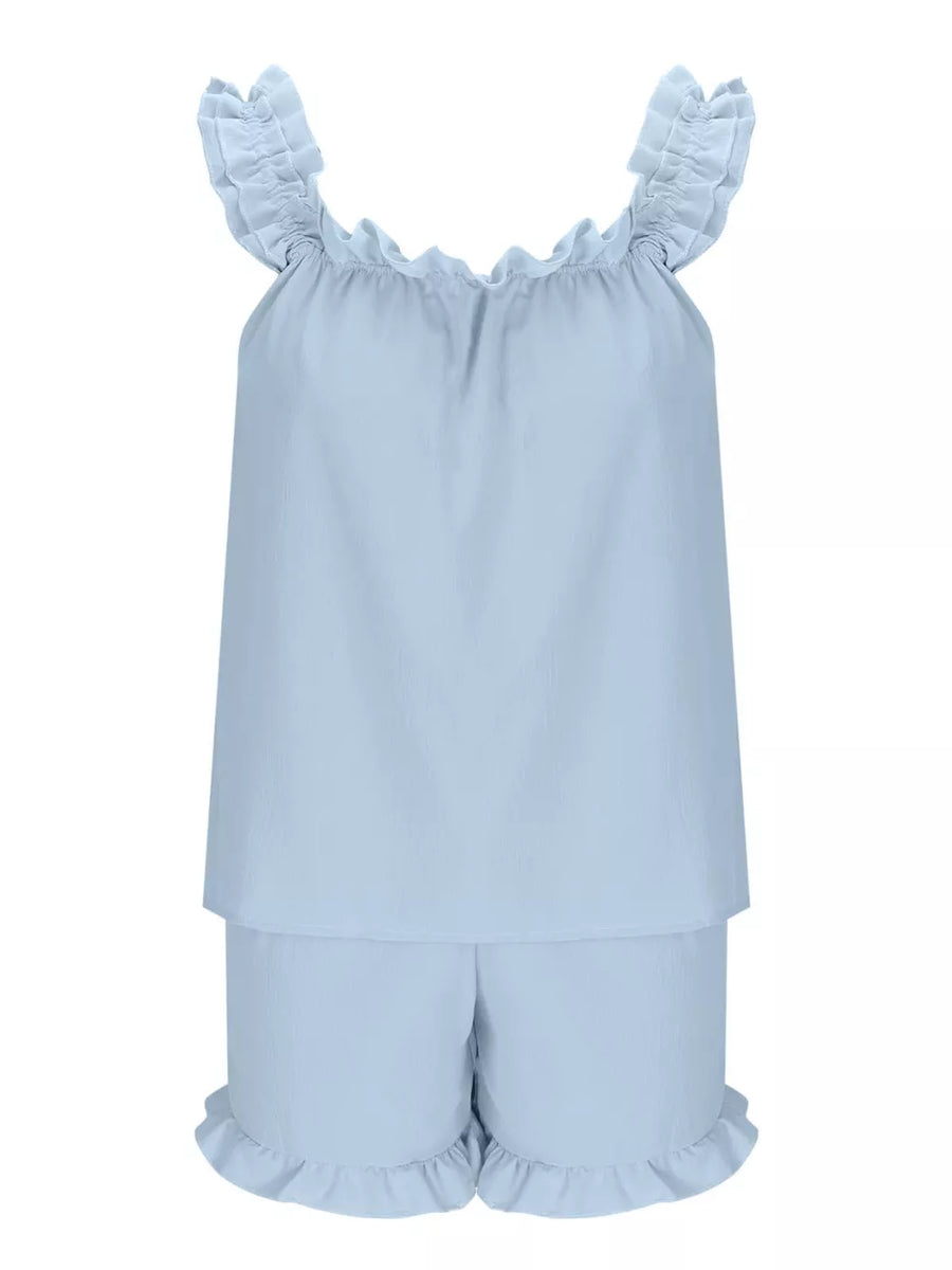 Light blue ruffled pajama set with cami top and shorts.