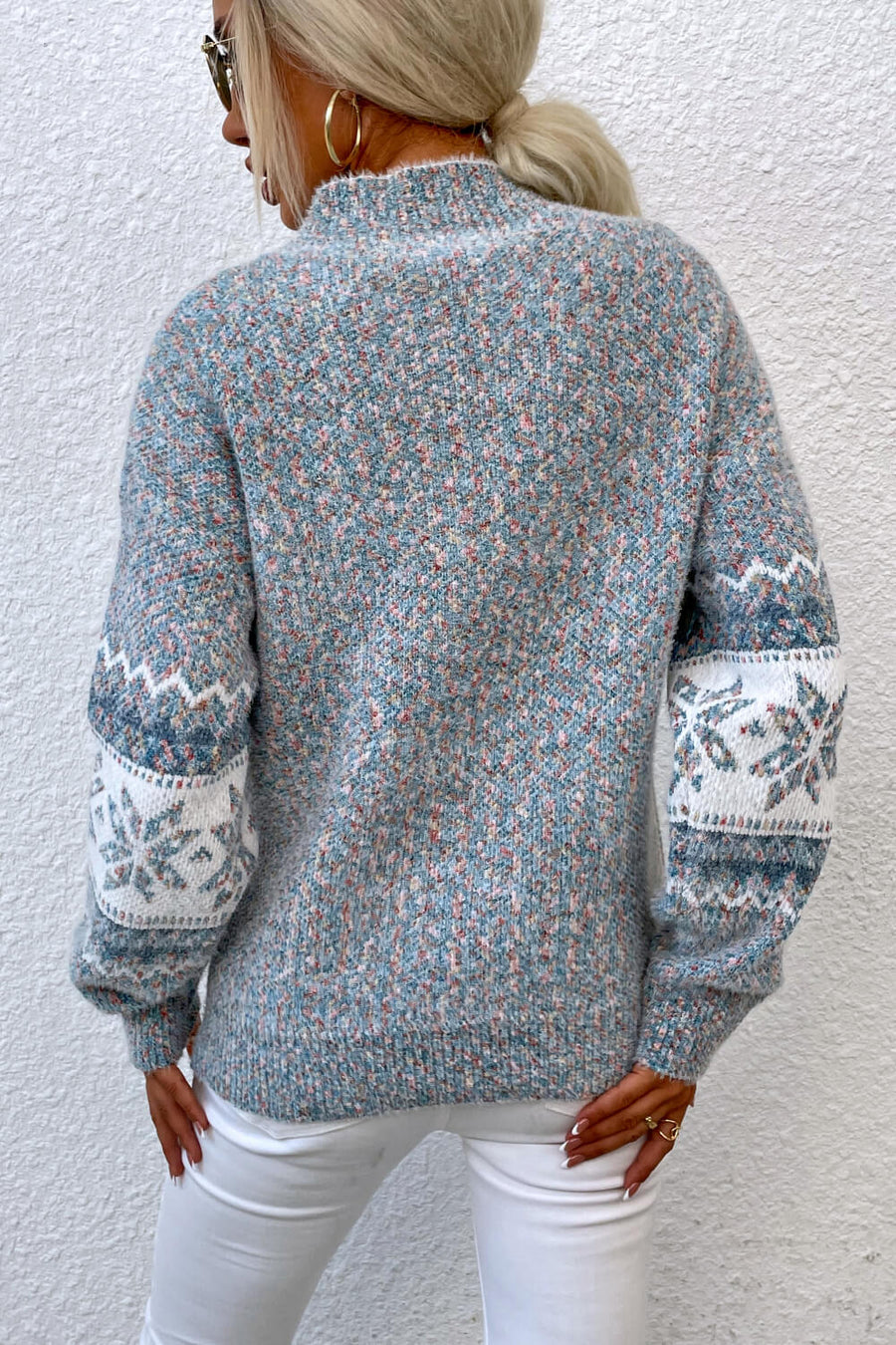 Nordic Fair Isle mock neck knit sweater in Cloudy Blue with snowflake pattern on sleeves.