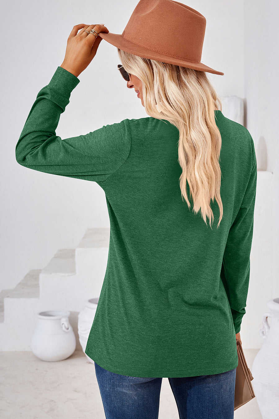 Dark green Henley button-down knit top with long sleeves, casual fit.