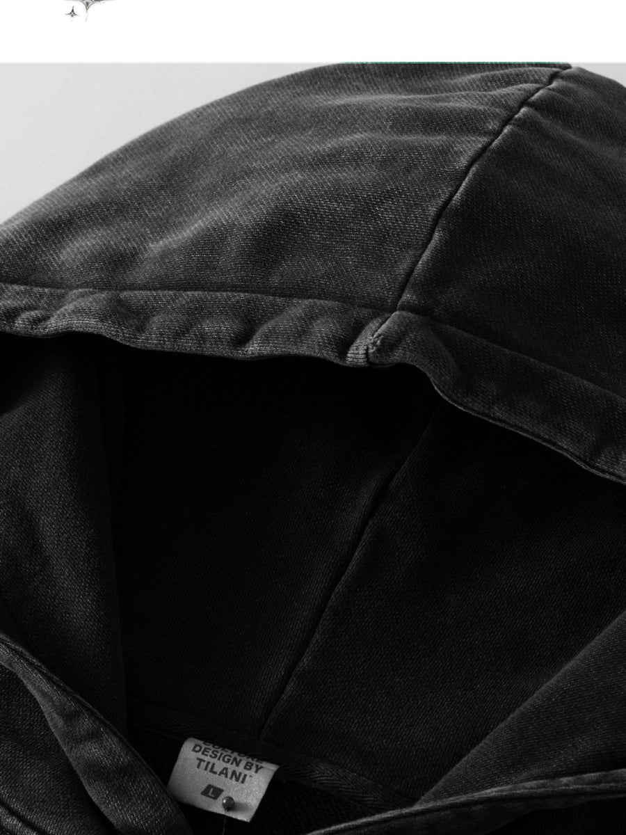 Black pullover hoodie featuring oversized and graphic-print