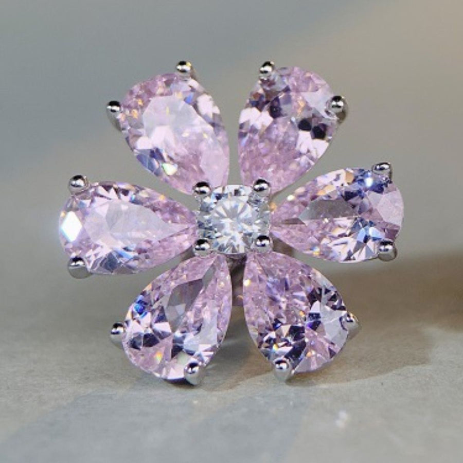 silver earrings featuring zircon stones and floral