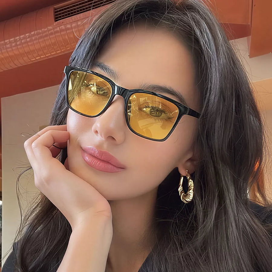 sunglasses in black featuring tinted lenses and square fit