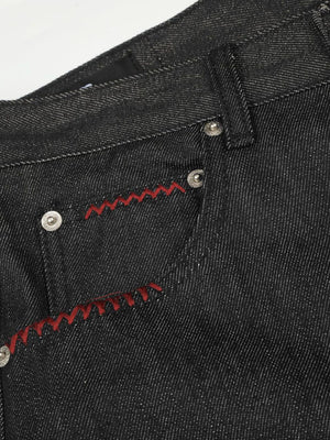 flare jeans in Black with button closure and full-length