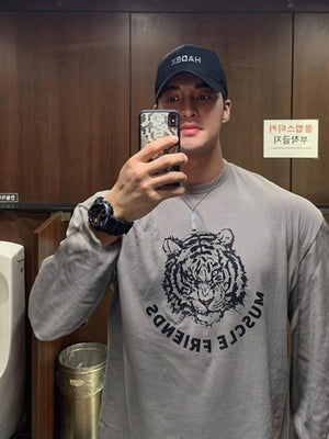 Gray long sleeve tee with bold tiger graphic and text