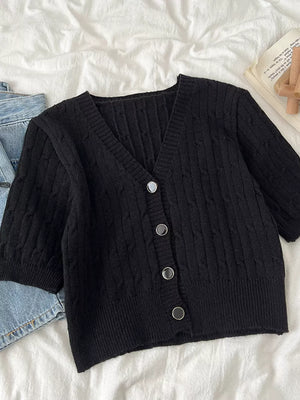 Black cable-knit cropped cardigan with V-neck and button front