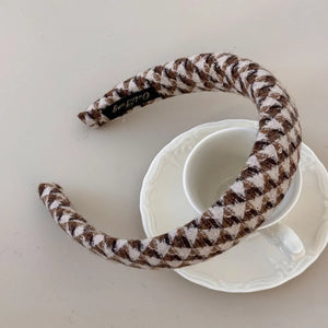 Textured tweed padded headband in coffee brown geometric pattern.