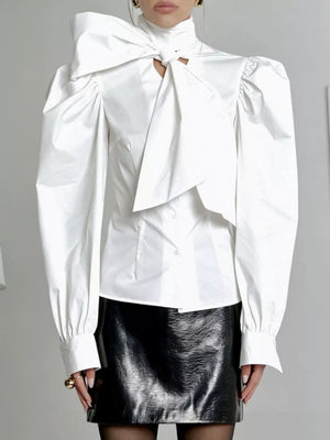 blouse in optic white featuring bow and fitted fit