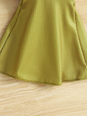 Baby bodysuit in clover green ribbed fabric with a flared hem detail.