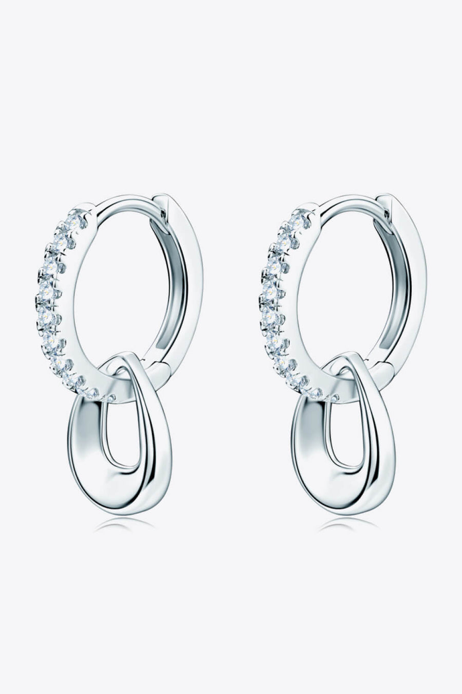 Sterling silver hoop earrings with pavé crystal accents and a polished teardrop charm.