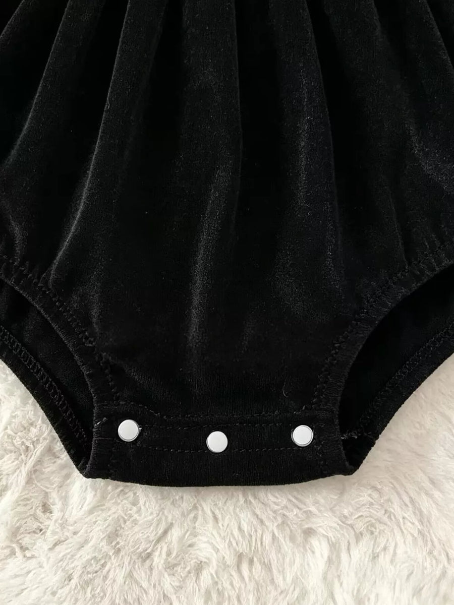 bodysuit in Black with graphic print and ruffled