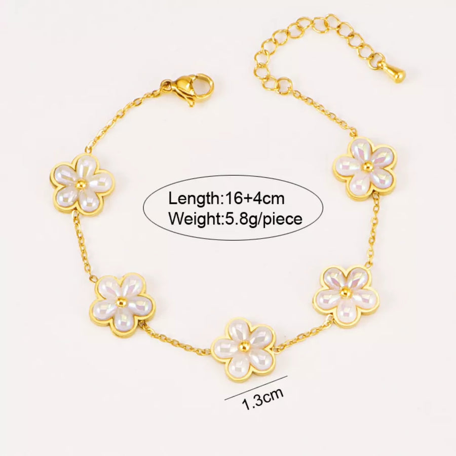 jewelry set featuring floral in ivory with 18K Gold-Plated,Resin,Stainless Steel Care instructions: Avoid wearing during ex