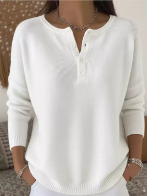 pullover sweater in white featuring ribbed and relaxed fit
