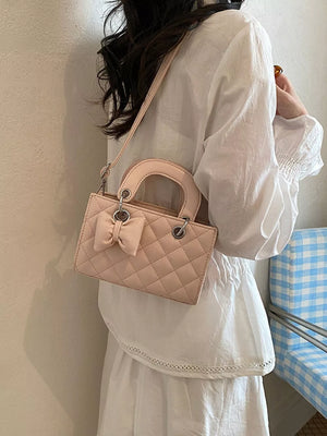 crossbody bag featuring quilted in Blush Pink with PU Leather Imported Size & texture
