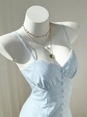 white mini dress featuring lace-up and polka dot