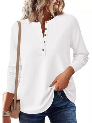 Apricot henley with buttoned placket and long sleeve